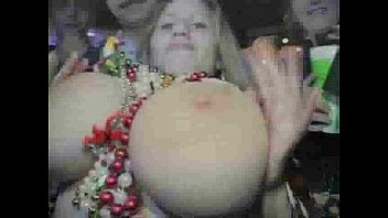 phat-titted dame displays melons at mardi.