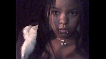 Ebony teen licking huge boobs on webcam
