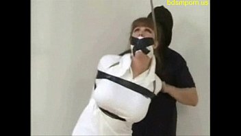 busty milf Darla Crane tape bondage with boobs out