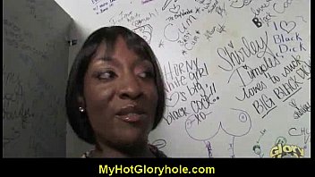 sizzling lady blows beefstick at gloryhole.