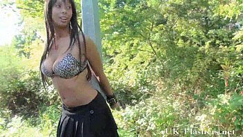 black teenie stunner flashes cupcakes and puss outdoors.